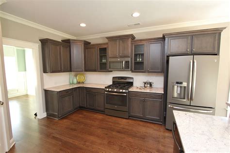 espresso cabinets with stain steel slate appliances|old fashioned espresso cabinets.